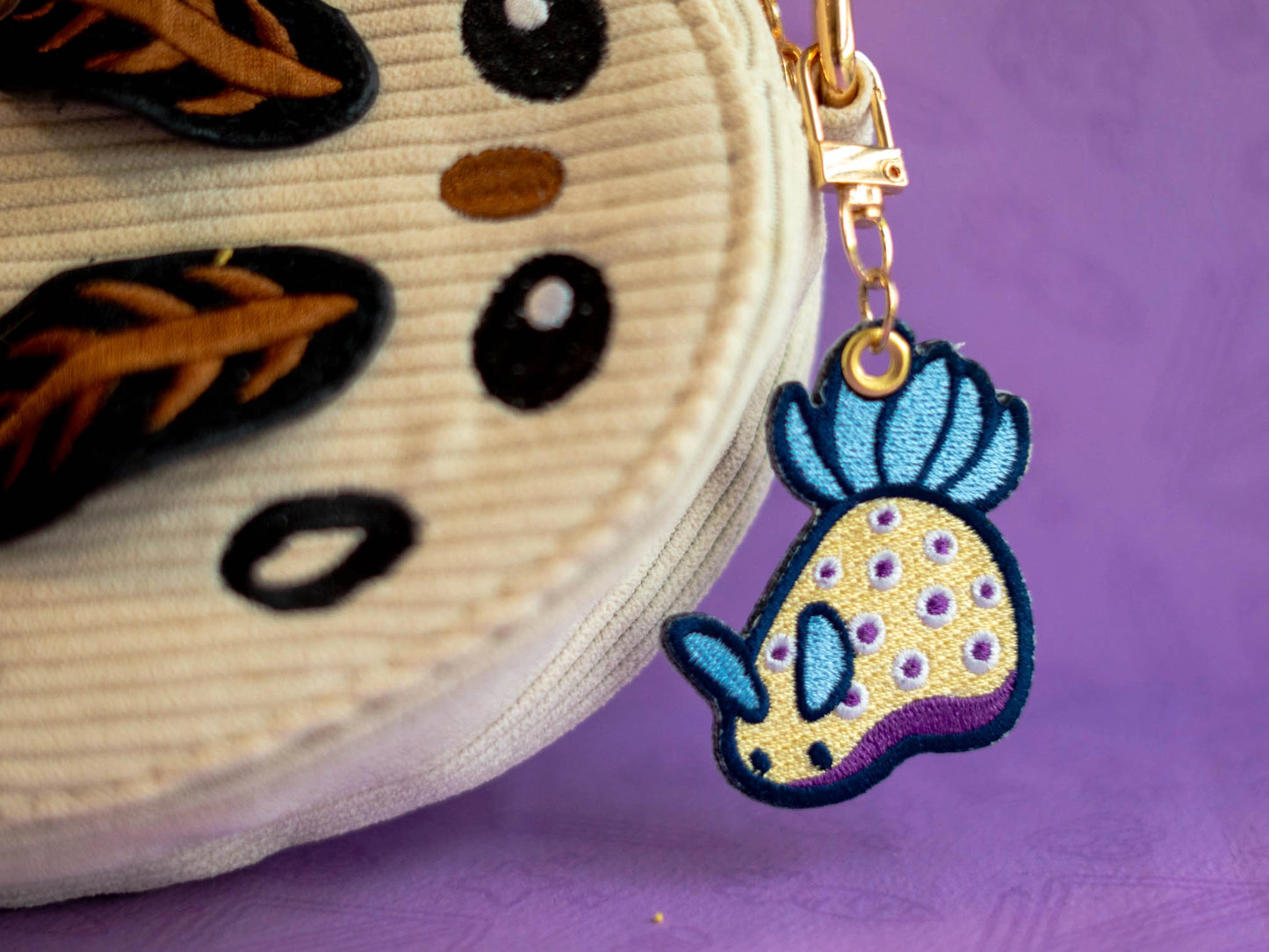 Kunies Nudi | Embroidered Charm
